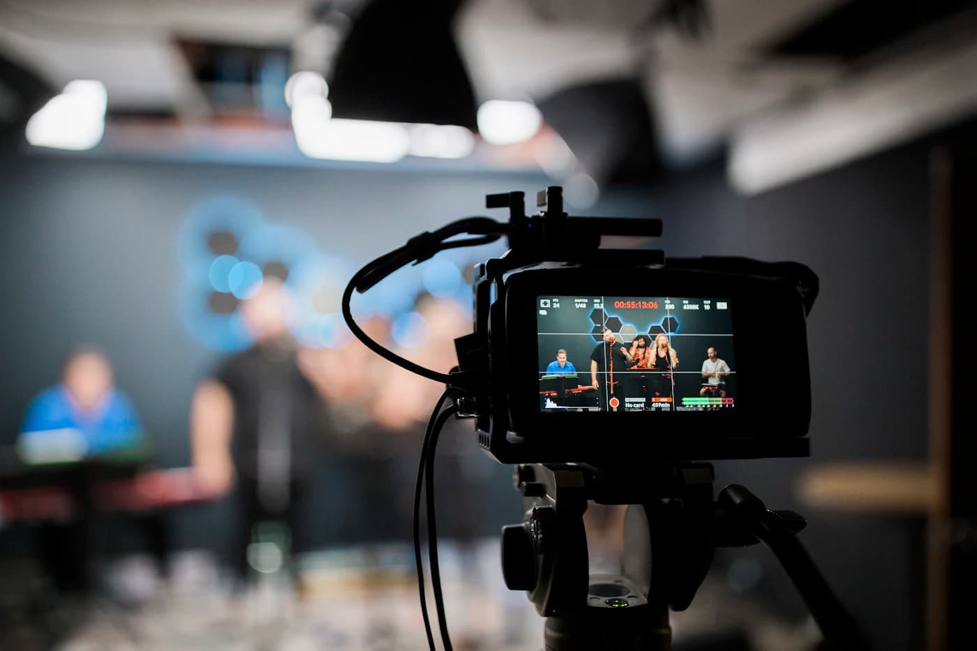 A professional video camera recording a performance
